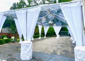 20' Clear Tent with Leg Drapes and Chandeliers