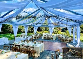 Clear Top Tent with White Taffeta Swag and Twinkle Lighting